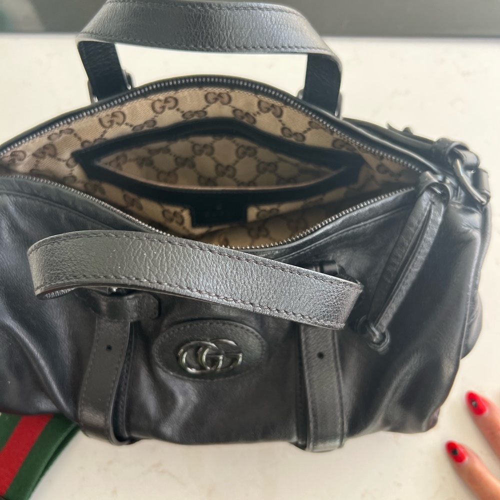 Excellent used condition Gucci duffle black bag
